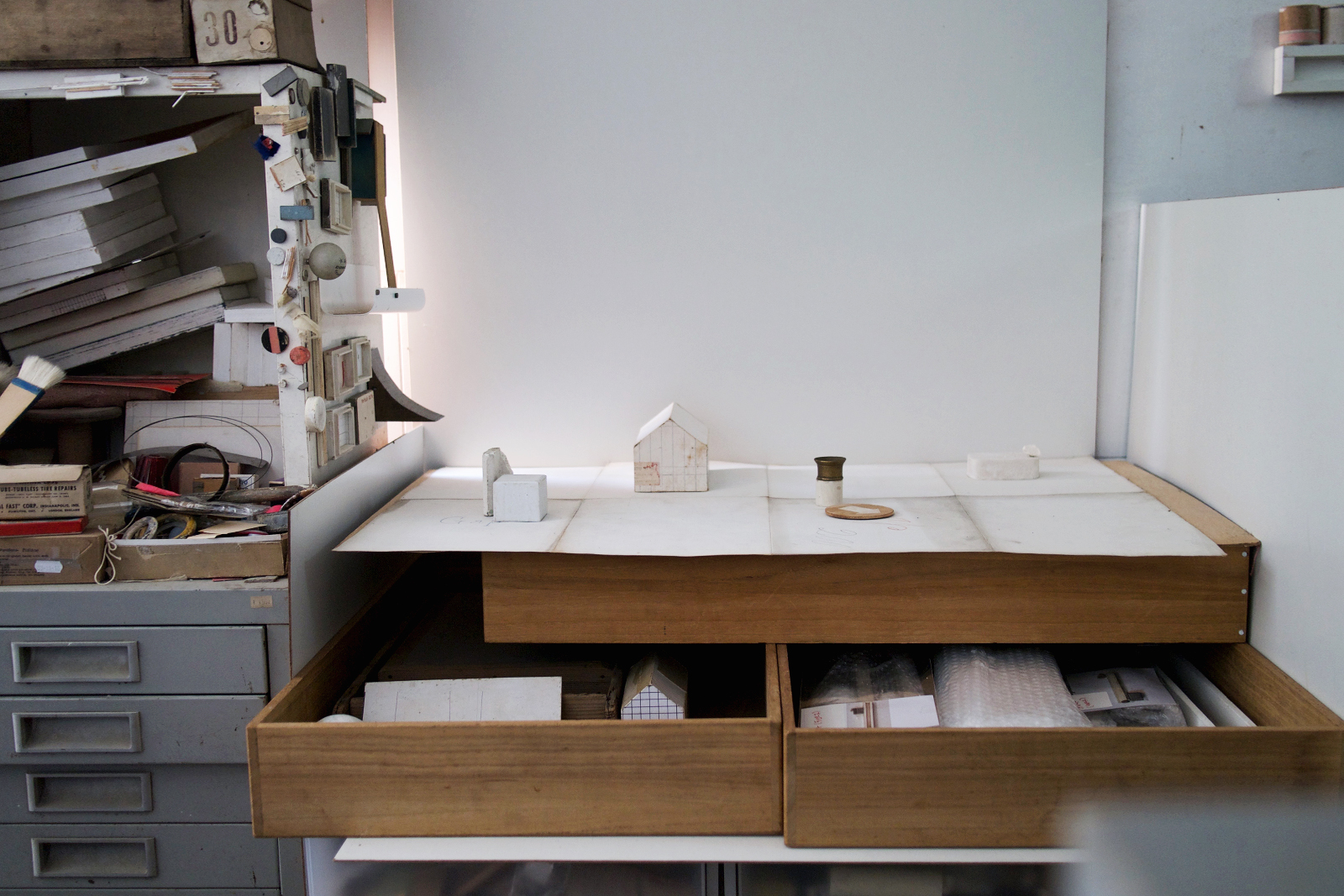 a house in progress sitting on a desk at Michiko Iwata's studio