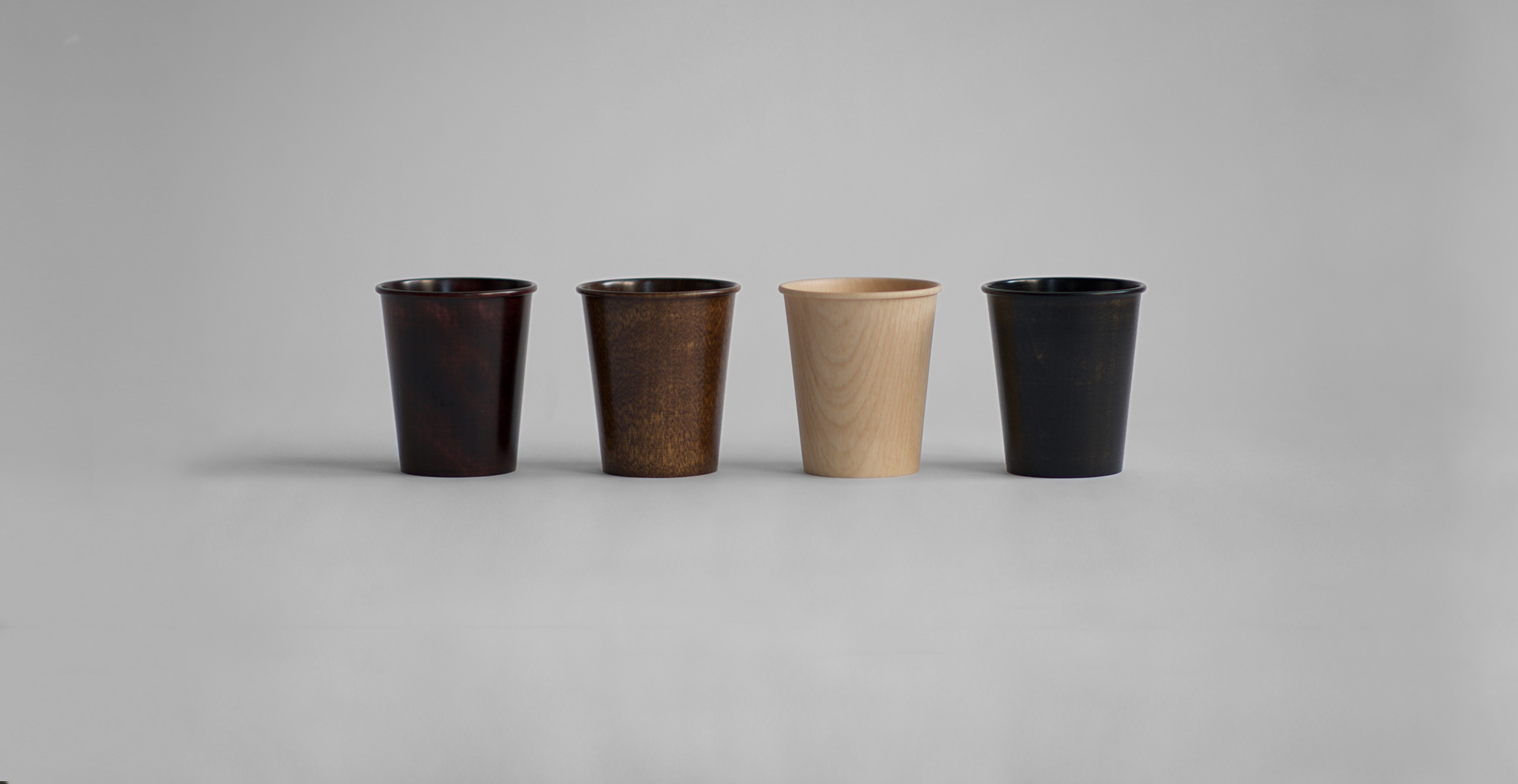 Wood cups against withe background