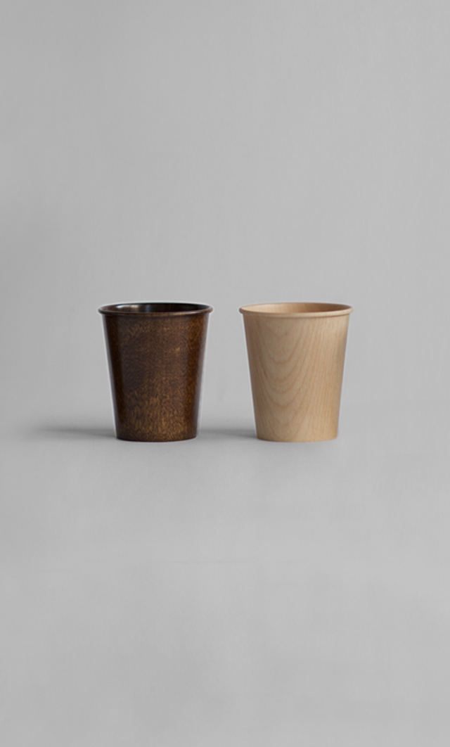 wood cups against white background