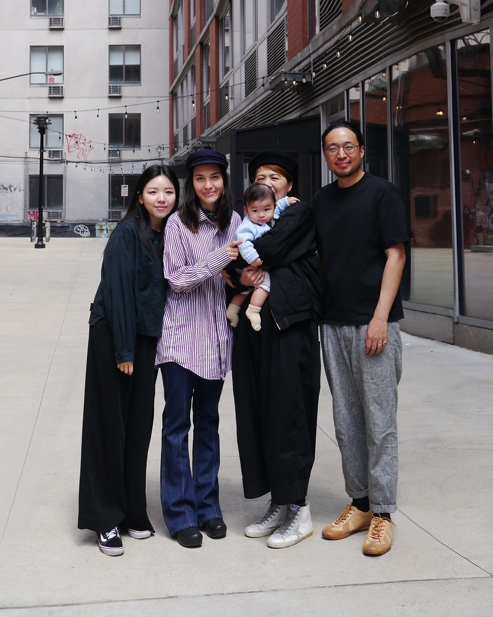 Nalata Nalata founders Angélique Chmielewski, Stevenson Aung and assistant manager Dani Sujin Lee, and baby in the Extra Place alley