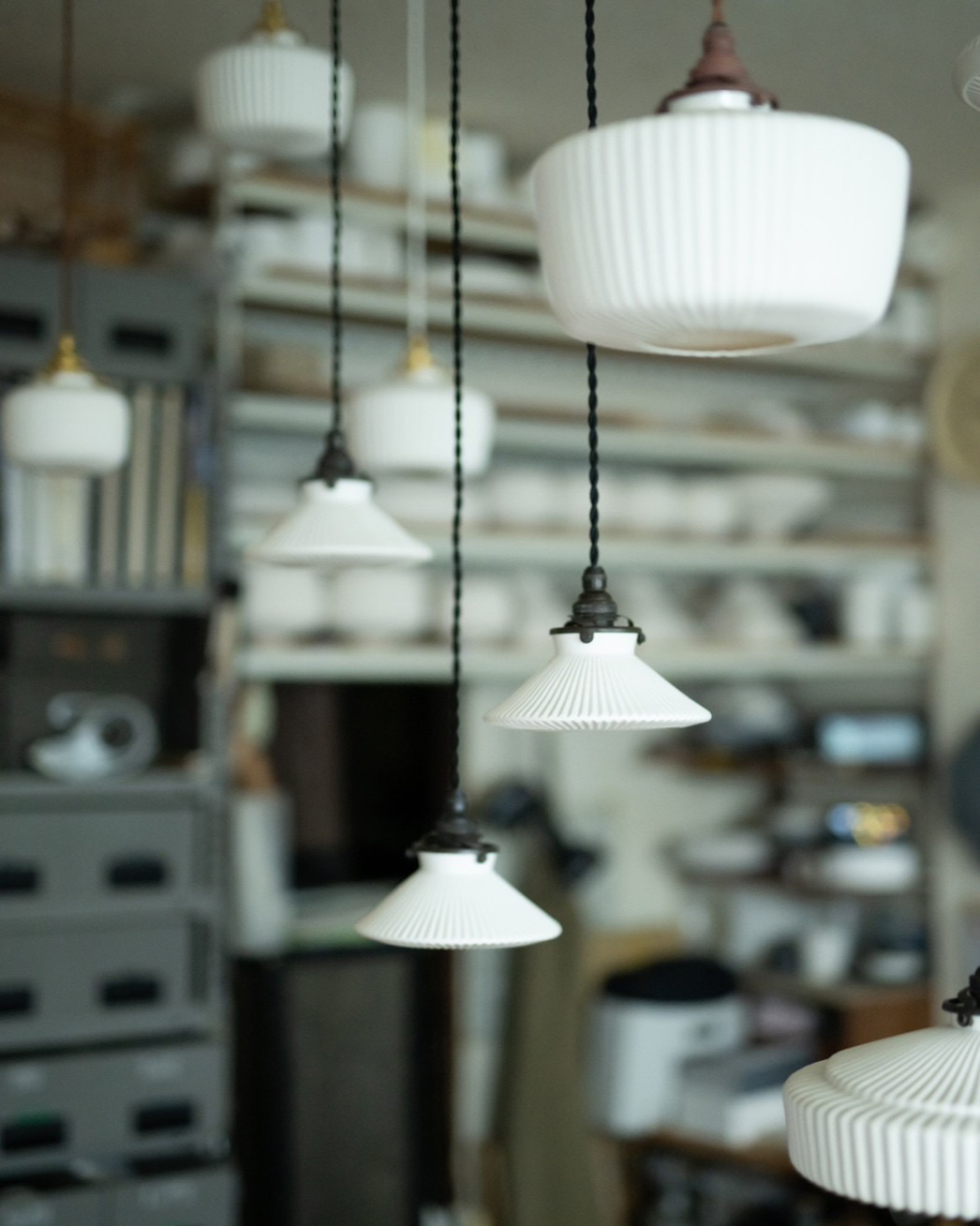 Hanging porcelain pendant lamps at the Tobimatsu Toki studio