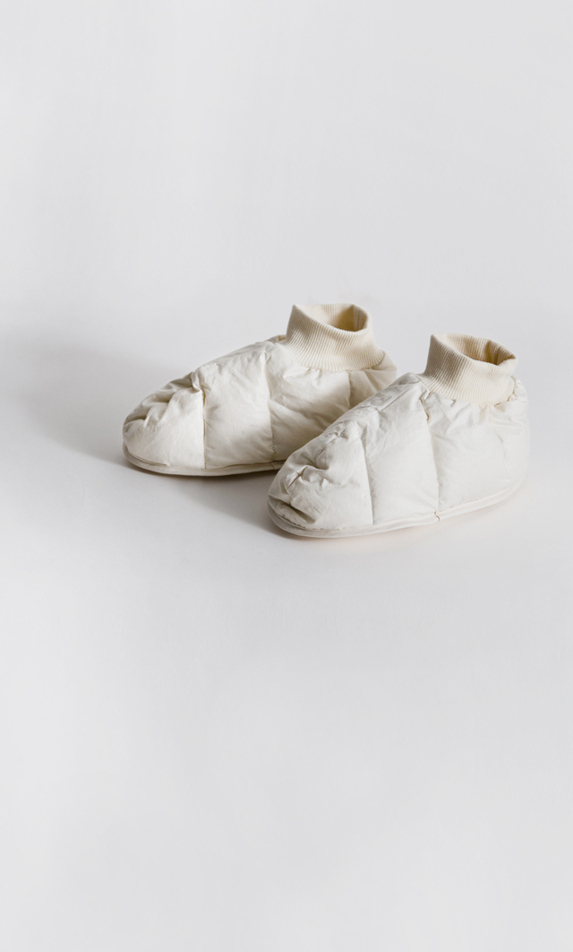 Image of Iwata down foot warmers against offwhite background