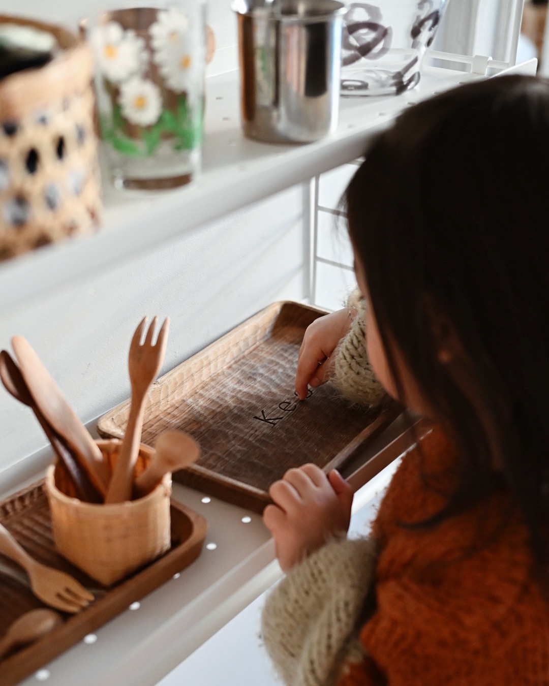 Child outline name on a carved wood plate