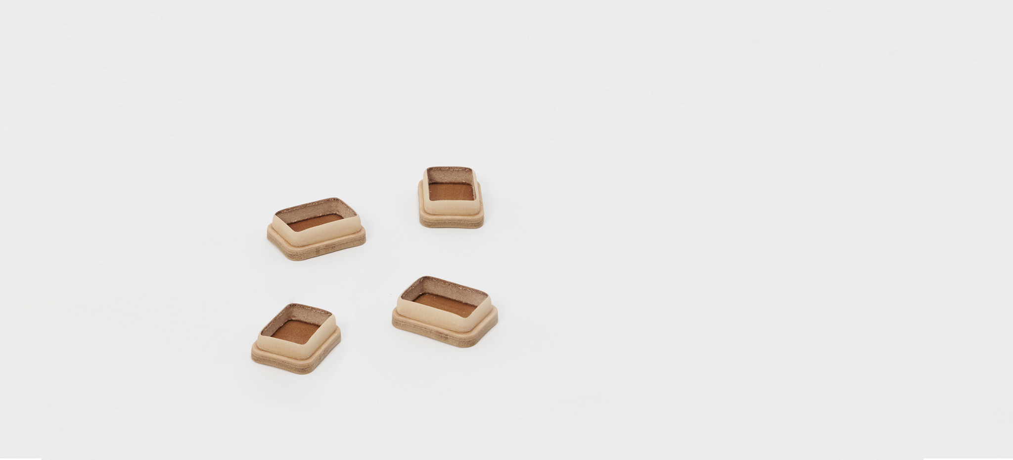 Shoes by Hender Scheme x Artek on a gray background
